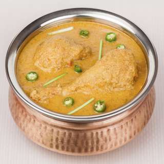 Curry de muslos de pollo estilo Korma